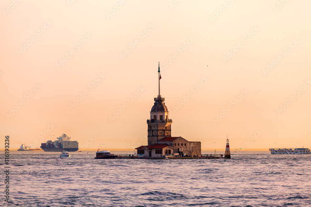 Maiden's Tower at sunset in Istanbul. Travel Turkey. View from the water. Kiz Kulesi. The tower on a small island in the Bosporus Strait.