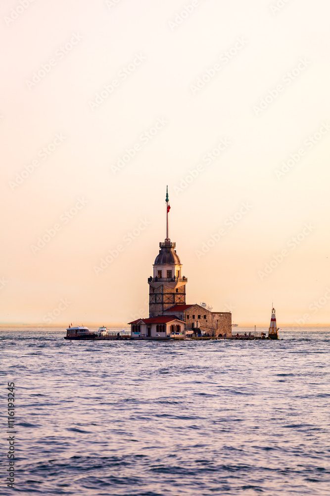 Maiden's Tower at sunset in Istanbul. Travel Turkey. View from the water. Kiz Kulesi. The tower on a small island in the Bosporus Strait.