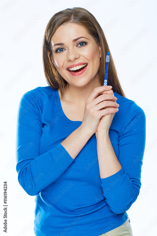 Toothy smiling beautiful woman with healthy teeth holding tooth Toothy smiling beautiful woman with healthy teeth holding tooth