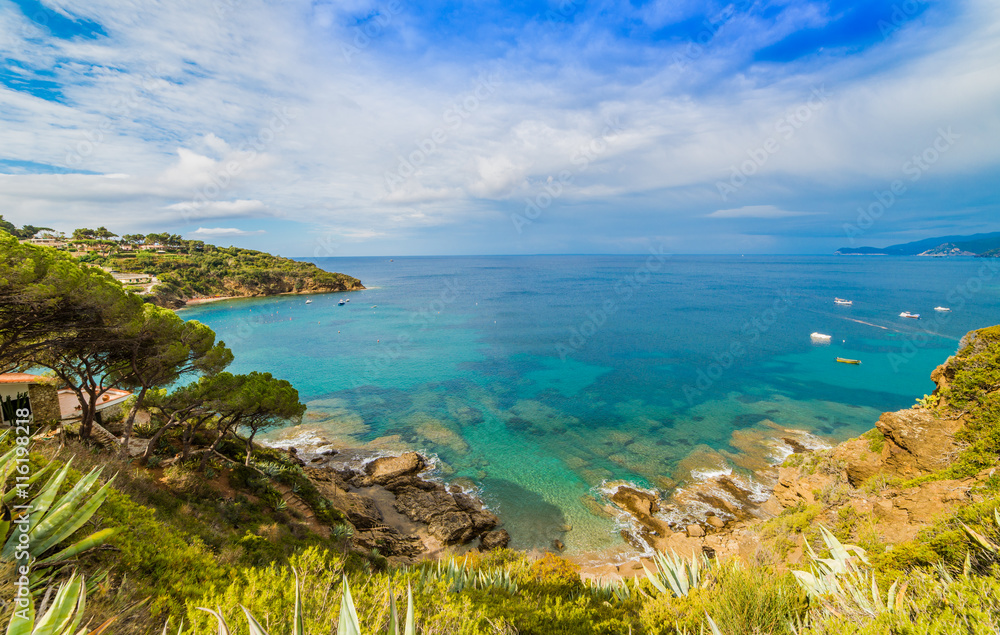 Beautiful landscape with Innamorata sea beach in summertime in Elba island, Italy Beautiful landscape with Innamorata sea beach in summertime in Elba island, Italy