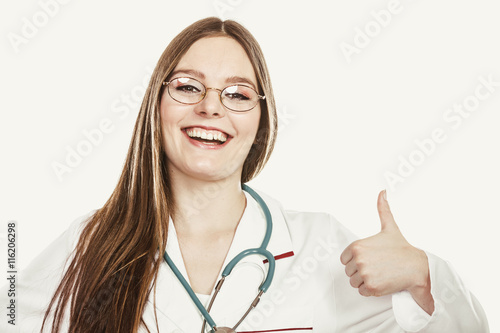 Smiling woman medical doctor with stethoscope.