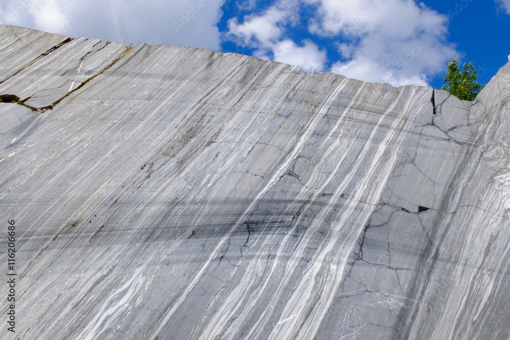Marble mountain rock cut in the natural environment. Marble career and