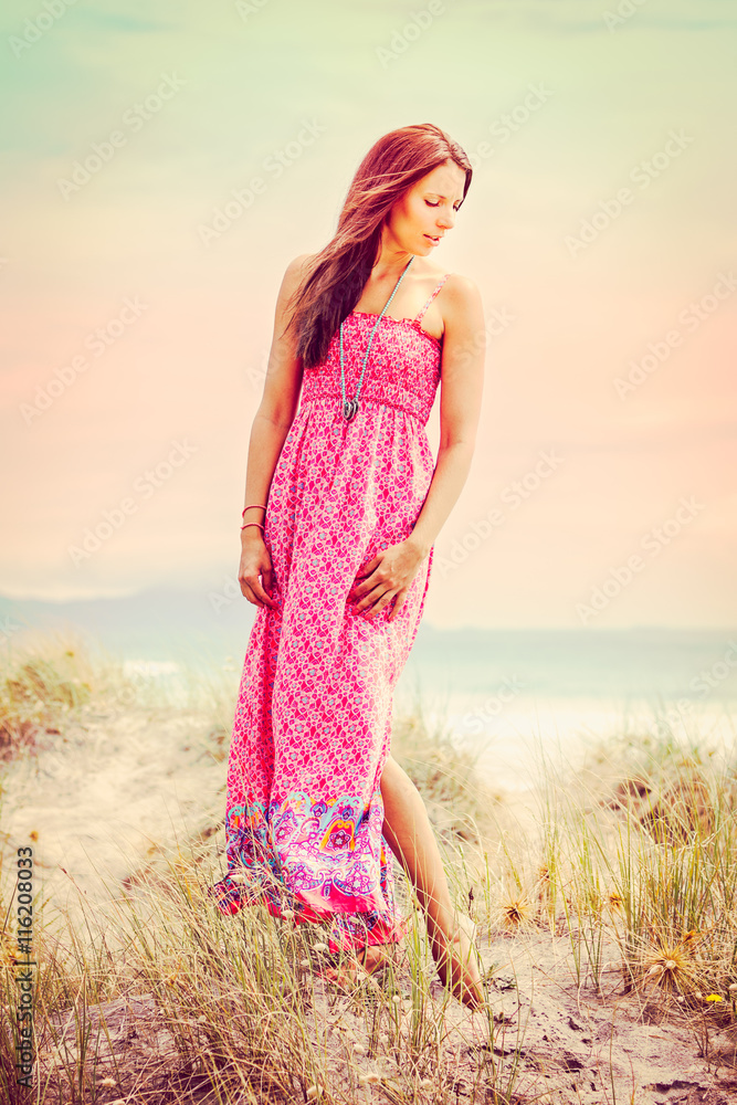 Obraz premium Woman at the Beach