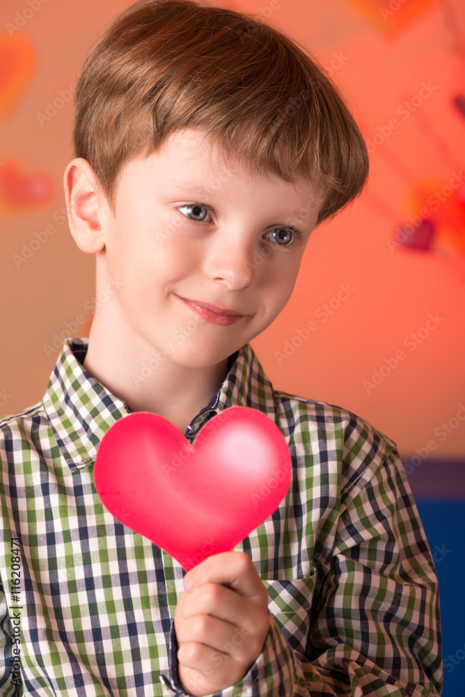 Boy with a heart in his hands Boy with a heart in his hands