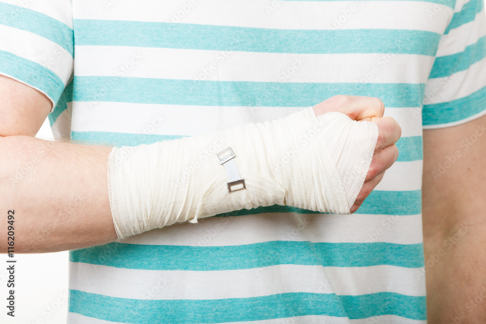 Obraz premium Part body man with bandaged hand.