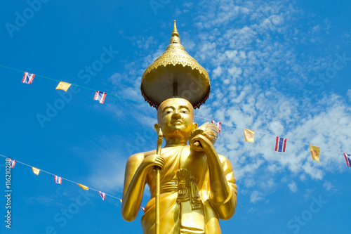 Samutprakarn  Thailand - July 19  Thai Buddhist decorate temple and Statue with Thailand flag and yellow Buddhism symbol flag to celebrating on Asalha Puja day before Khao Phansa day.