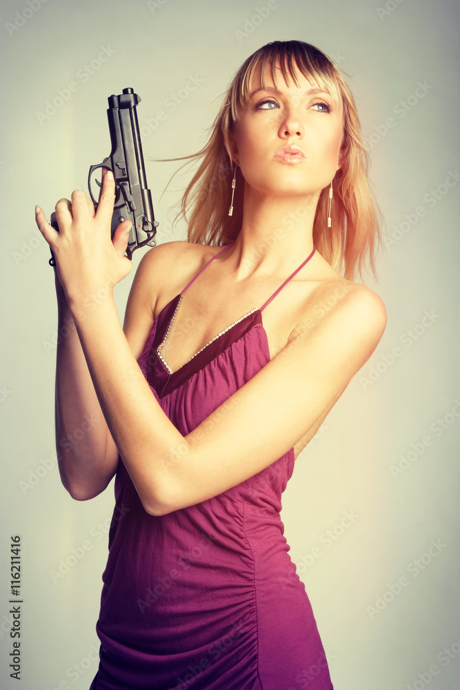 Woman Holding Gun