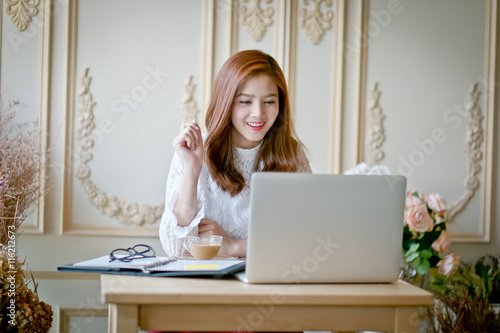 Woman with laptop watching movie