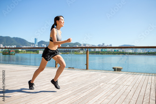 Woman running in seaside