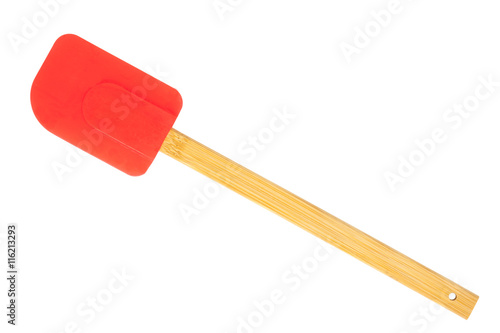 Red silicon spatula with wood handle.