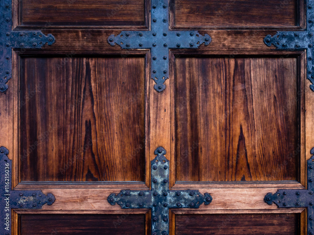 Old wooden medieval gate door
