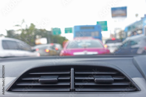 Air conditioning car vent on the blur traffic background. © kaymotec