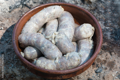 sausages are not grilled in the plate