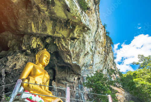 Buddha statues on mountains, with blue sky, Thailand