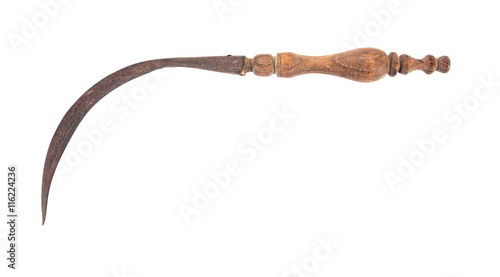 Old vintage rusty sickle with wood carving handle isolated on wh