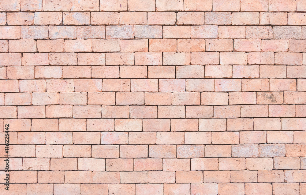 Fototapeta premium Closeup surface brick pattern at old brown stone brick wall texture background