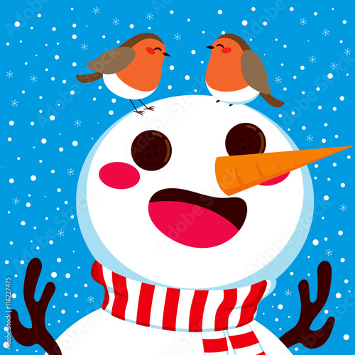 Happy snowman with his two robin birds friends together on his head on winter snowfall background