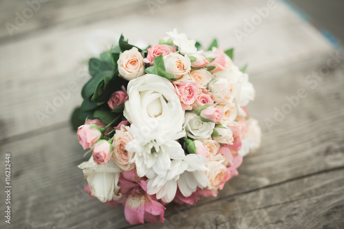 Wonderful luxury wedding bouquet of different flowers © olegparylyak