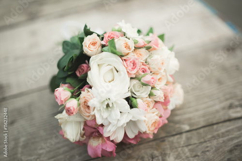 Wonderful luxury wedding bouquet of different flowers