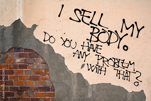 I Sell My Body - Handwritten graffiti sprayed on the wall, anarchist aesthetics - doing sex for money, prostitution, pornography, surrogacy, egg and sperm donation, black organ trade