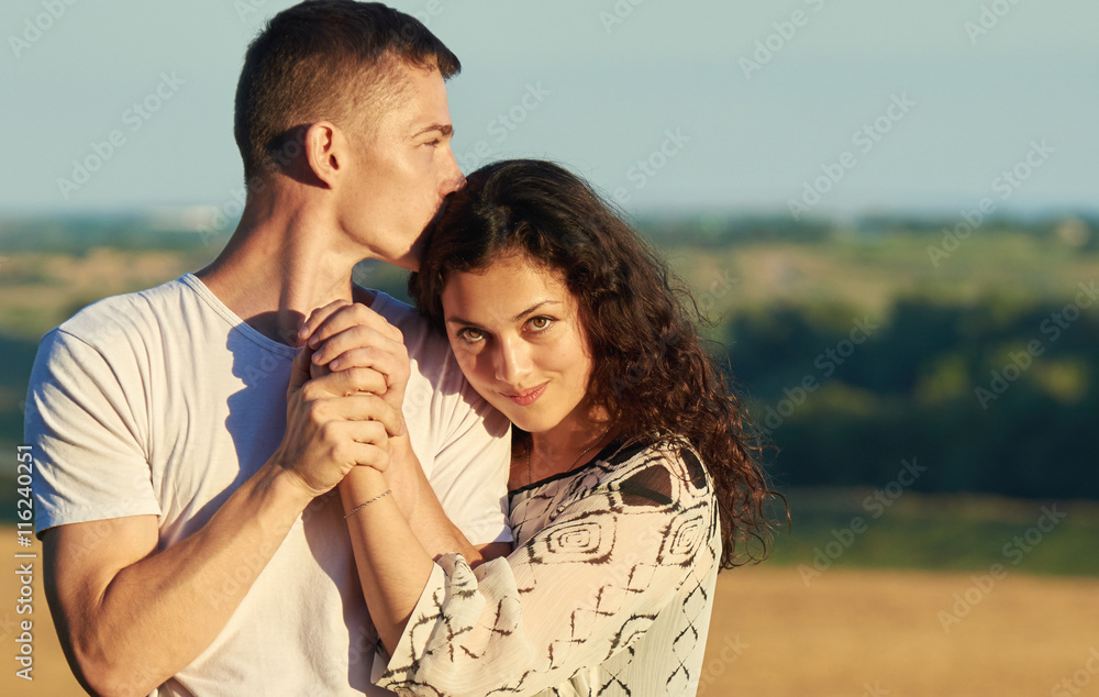 happy young couple posing high on country outdoor, romantic people concept, summer season happy young couple posing high on country outdoor, romantic people concept, summer season