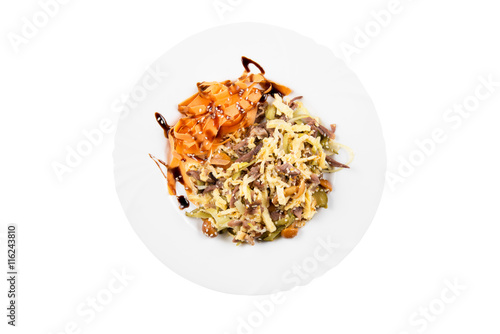 Salad with meat, carrot, mushrooms, eggs and mayonnaise, isolated