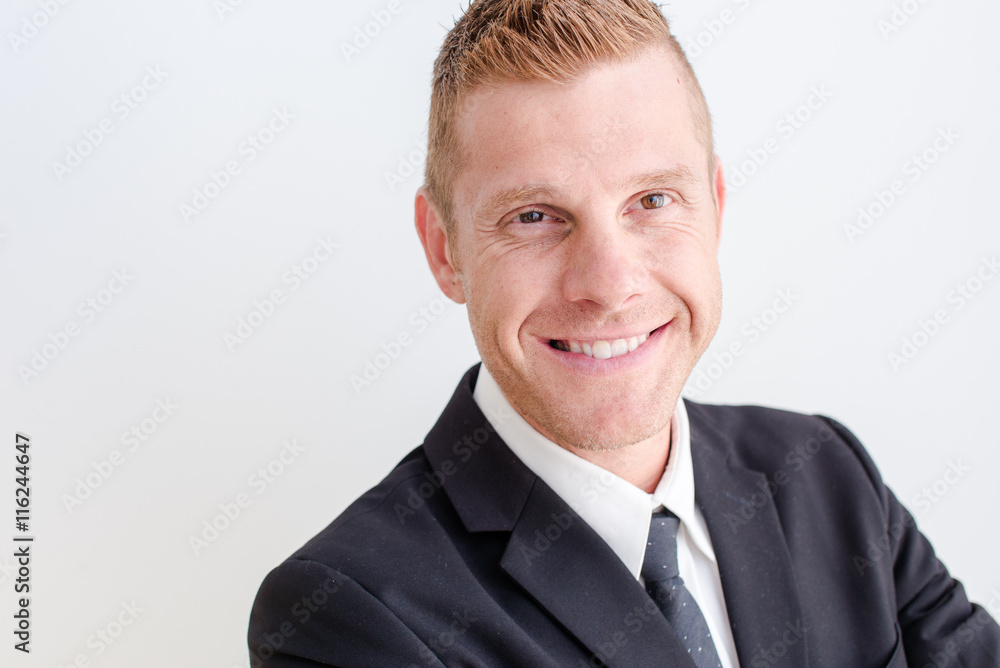 Portrait of young happy smiling business man, isolated over white background Portrait of young happy smiling business man, isolated over white background