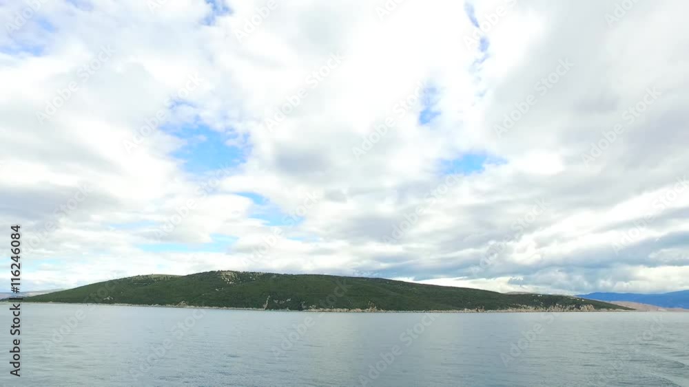 Sailing on the sea on a cloudy day. Sailing on the sea on a cloudy day.