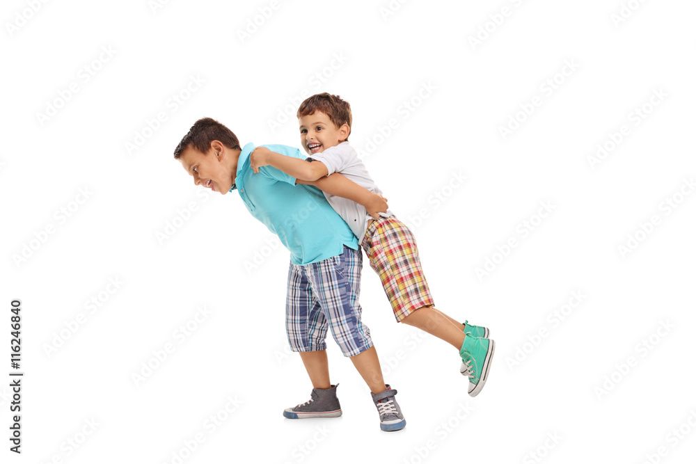 Two children playing with each other Two children playing with each other