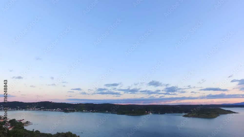 Beautiful sunset, small boats, marina, islands. Perfect evening to enjoy romantic moments. Beautiful sunset, small boats, marina, islands. Perfect evening to enjoy romantic moments.