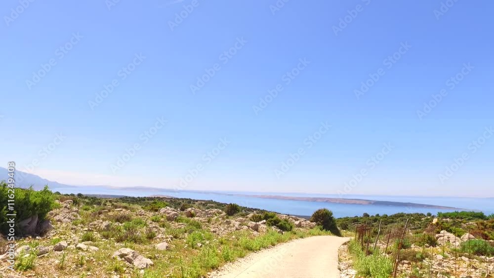 Dangerous dried landscape with big and small sharp rocks on sunny summer day. Dangerous dried landscape with big and small sharp rocks on sunny summer day.