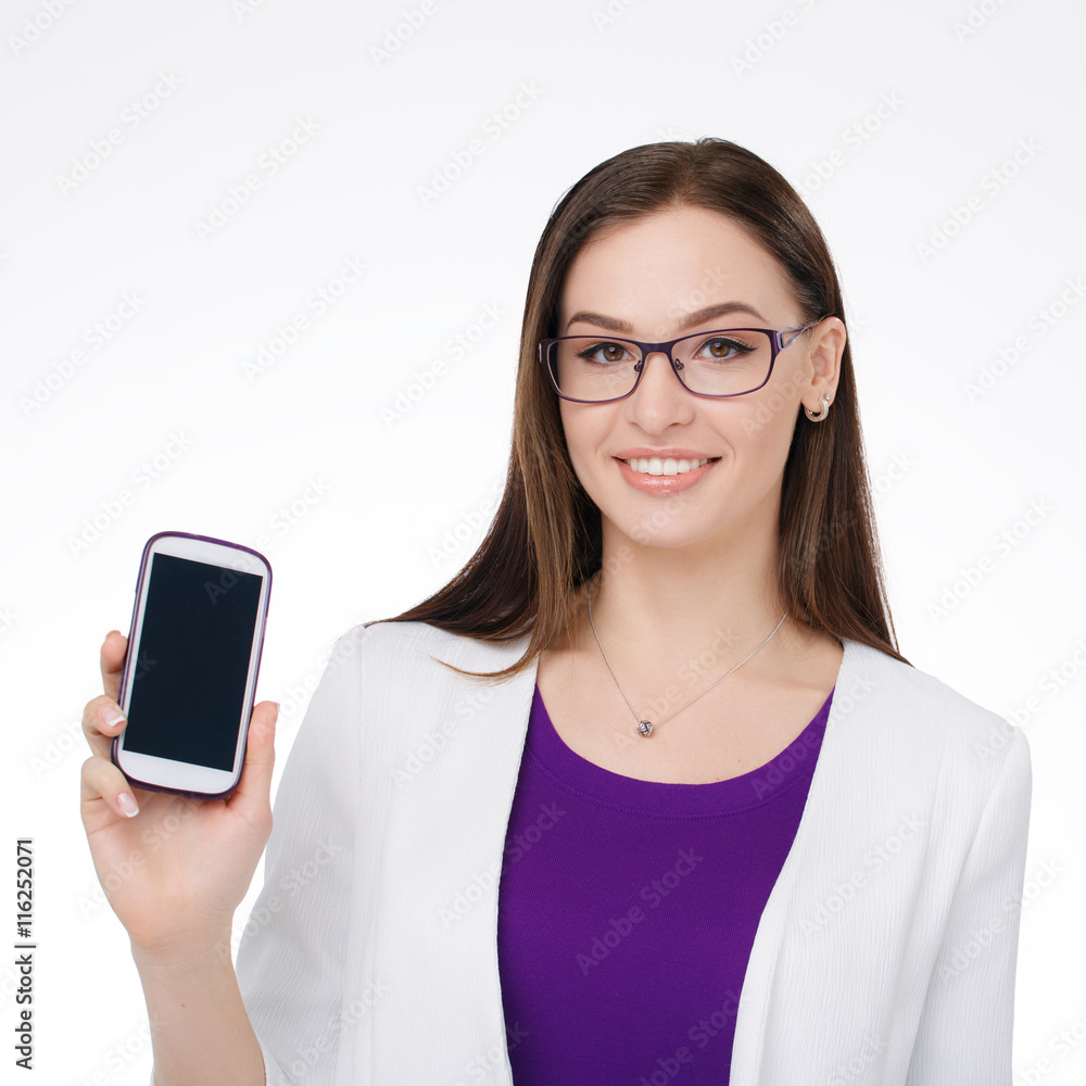 young businesswoman smiling with cell phone in the hand young businesswoman smiling with cell phone in the hand