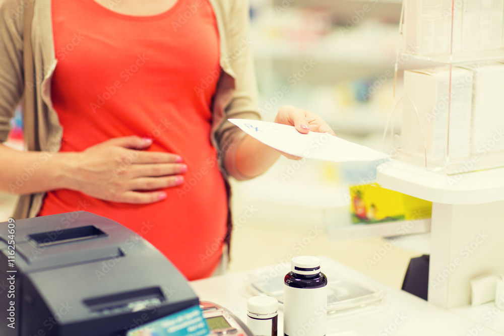 pregnant woman buying medication at pharmacy pregnant woman buying medication at pharmacy