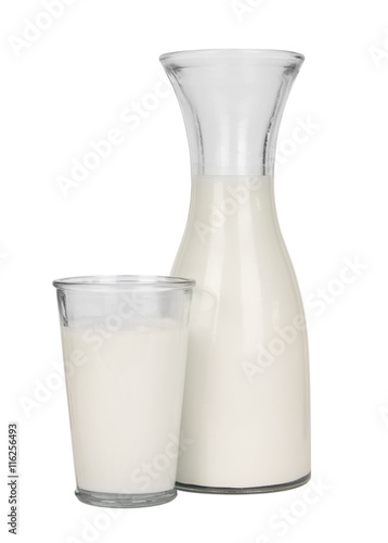 A vintage style glass bottle of milk and glass isolated on a white background
