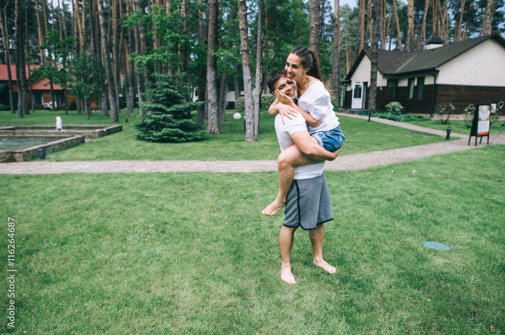 young couple in love having fun and enjoying the beautiful natur