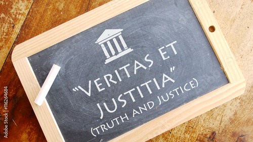 Veritas et Justitia. A Latin phrase meaning “truth and Justice”. Albright College’ s motto.