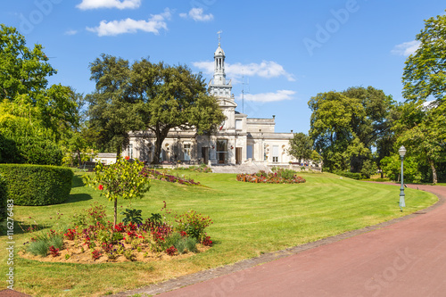 Cognac, France. The picturesque city park and the city hall building