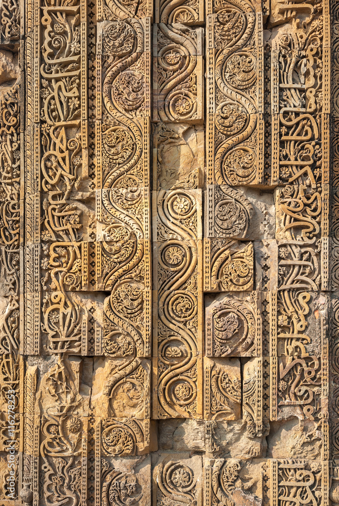 Carved walls of Qutub Minar complex, Delhi, India