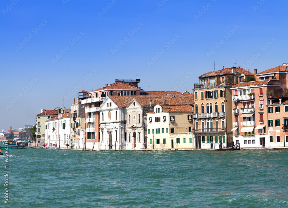 Venice. Italy. Bright ancient buildings ashore Canal Grande
