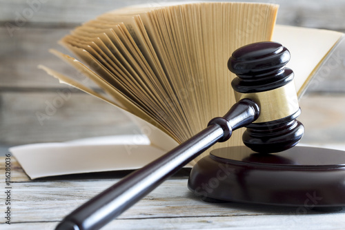 Law concept. Gavel, statue and book