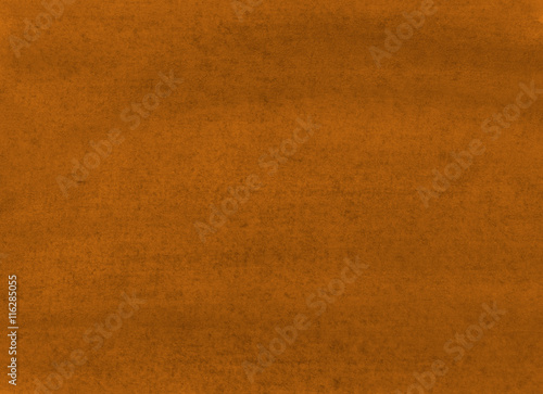 The texture of a sheet of paper painted with brown paint
