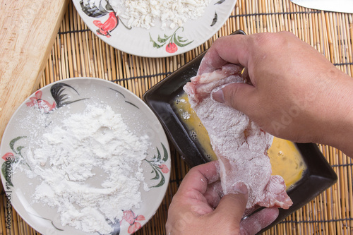 pork and flour with bread crumb for cooking tongkatsu photo