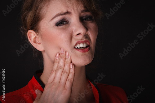 Negative emotion. Woman having tooth ache.