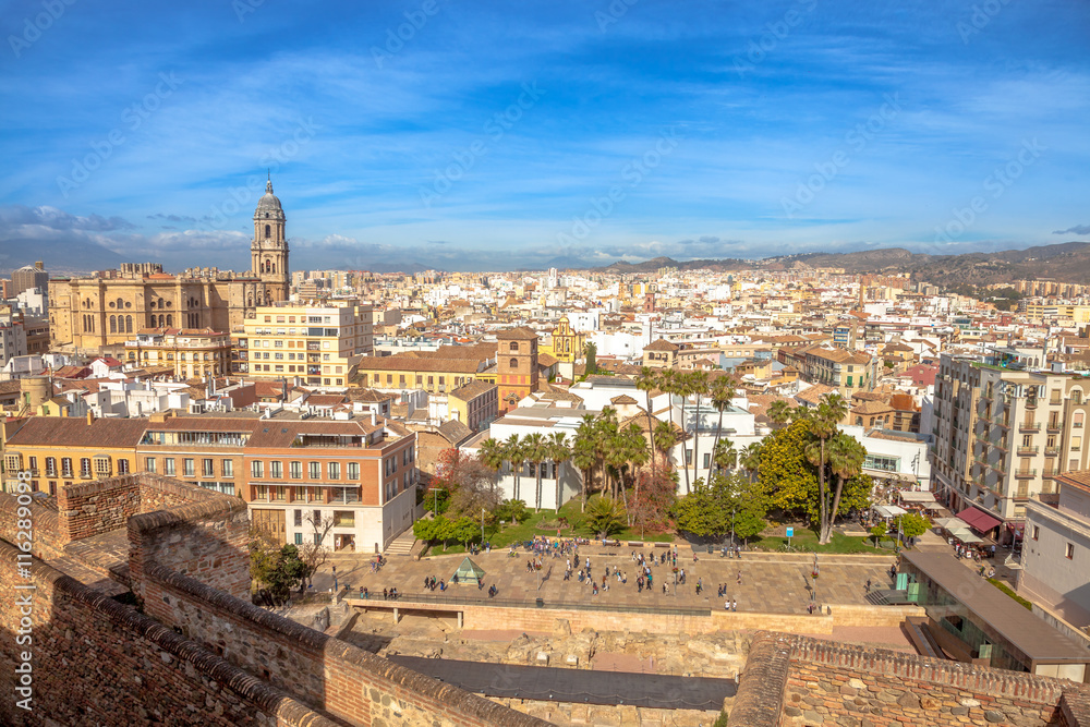 Panoramic view at Alcazaba of Malaga with skyline of city, the best preserved Moorish fortress palace in Andalusia, Spain.