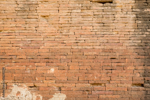 Close up clay orange brick wall texture background