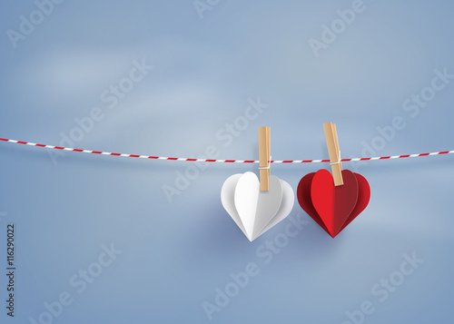 paper heart shape hanging on the lope