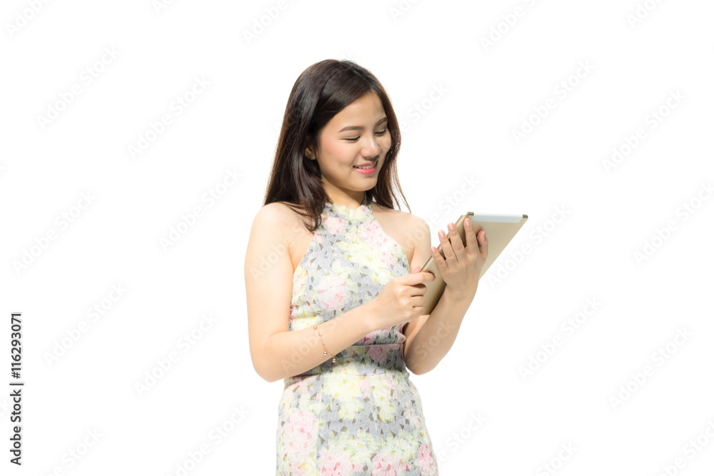 Portrait of attractive Beautiful Young Asian women using a tablet with happiness and concentrate. Female model isolated on white background. Portrait of attractive Beautiful Young Asian women using a tablet with happiness and concentrate. Female model isolated on white background.