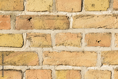 close up of orange brick wall texture background