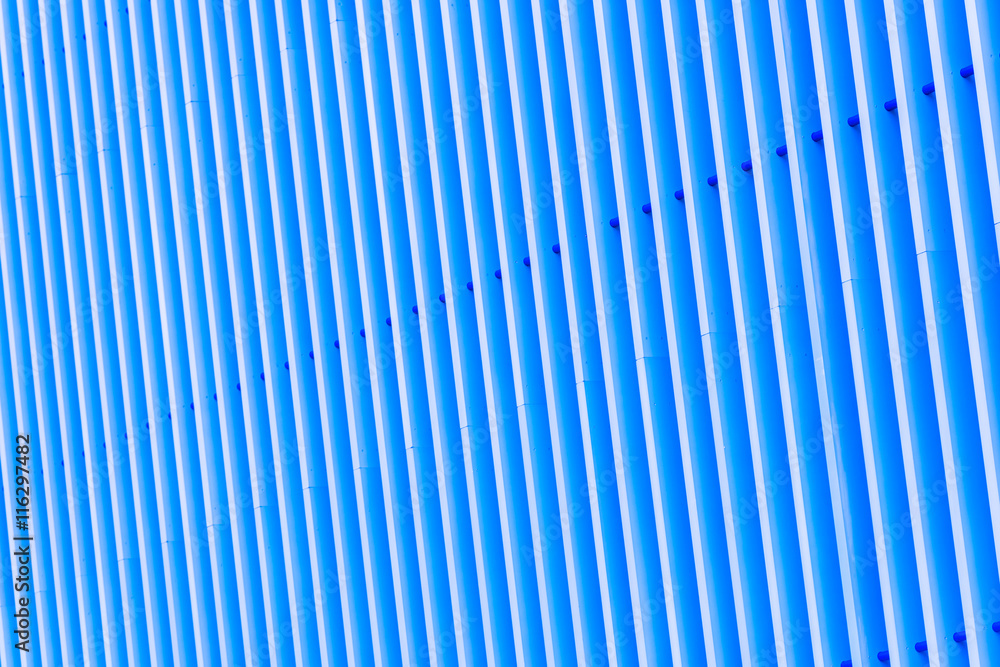 Obraz premium Detail of blue striped metal facade for background