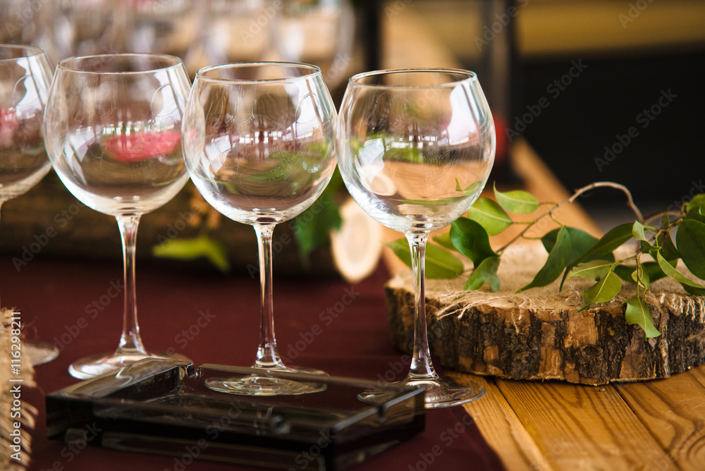 Three empty vine glasses